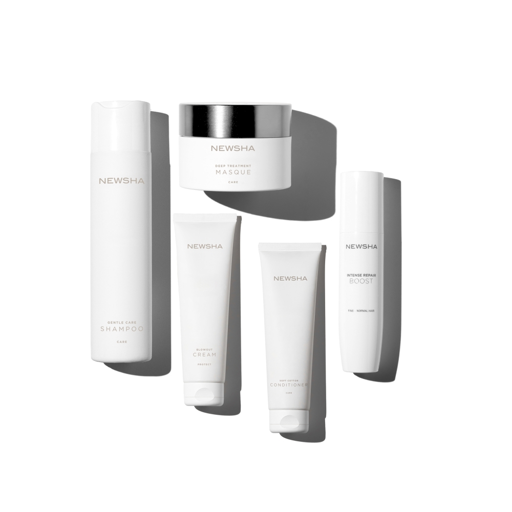 Pflegeset von NEWSHA mit Gentle Care Shampoo, Deep Treatment Masque, Blowout Cream, Soft Cotton Conditioner und Intense Repair Boost für die sanfte Reinigung, intensive Reparatur und geschmeidiges Styling feiner bis normaler Haare.