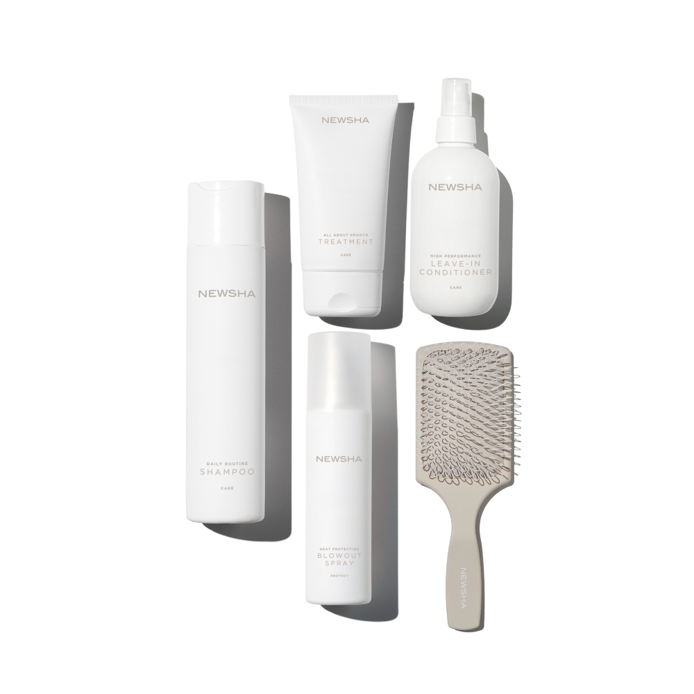 NEWSHA Daily Haircare Set bestehend aus Shampoo, Treatment, Leave-in Conditioner, Hitzeschutz-Spray und Paddle Brush – perfekte Haarpflege-Routine für geschmeidiges, gesundes Haar im Alltag.